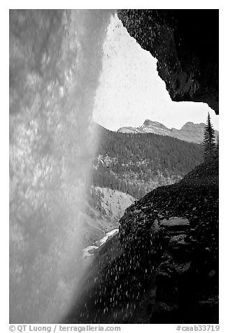 Panther Falls and ledge from behind. Banff National Park, Canadian Rockies, Alberta, Canada (black and white)