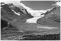 Icefields Center and Athabasca Glacier flowing from Columbia Icefields. Jasper National Park, Canadian Rockies, Alberta, Canada (black and white)