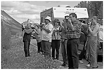 Tourists lined up on Icefields Parkway to photograph wildlife. Jasper National Park, Canadian Rockies, Alberta, Canada (black and white)