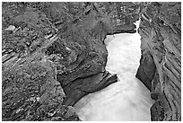 Canyon at the base of Athabasca Falls. Jasper National Park, Canadian Rockies, Alberta, Canada ( black and white)