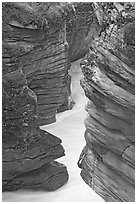 Narrow canyon at the base of Athabasca Falls. Jasper National Park, Canadian Rockies, Alberta, Canada ( black and white)