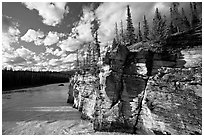 Cliff and Athabasca River, late afternoon. Jasper National Park, Canadian Rockies, Alberta, Canada (black and white)