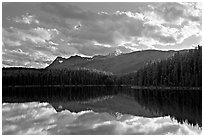 Peaks and clouds reflected in Leach Lake, sunset. Jasper National Park, Canadian Rockies, Alberta, Canada (black and white)