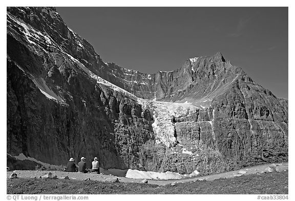 Hikers look at Angel Glacier, late morning. Jasper National Park, Canadian Rockies, Alberta, Canada