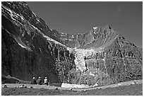 Hikers look at Angel Glacier, late morning. Jasper National Park, Canadian Rockies, Alberta, Canada ( black and white)