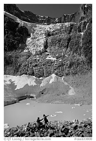 Family looking at Cavell Pond and Angel Glacier. Jasper National Park, Canadian Rockies, Alberta, Canada