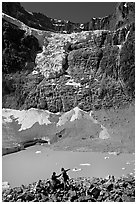 Family looking at Cavell Pond and Angel Glacier. Jasper National Park, Canadian Rockies, Alberta, Canada ( black and white)