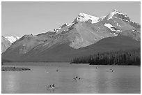 Canoes on Maligne Lake, afternoon. Jasper National Park, Canadian Rockies, Alberta, Canada (black and white)