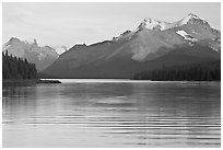 Peaks reflected in rippled water, Maligne Lake, sunset. Jasper National Park, Canadian Rockies, Alberta, Canada ( black and white)