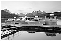 Tour boat dock, Maligne Lake, sunset. Jasper National Park, Canadian Rockies, Alberta, Canada ( black and white)