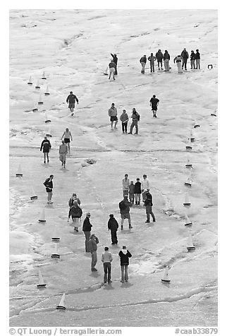 People in delimited area, Athabasca Glacier. Jasper National Park, Canadian Rockies, Alberta, Canada (black and white)