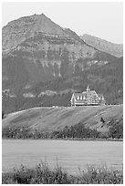 Prince of Wales hotel, lake and mountain, dawn. Waterton Lakes National Park, Alberta, Canada (black and white)