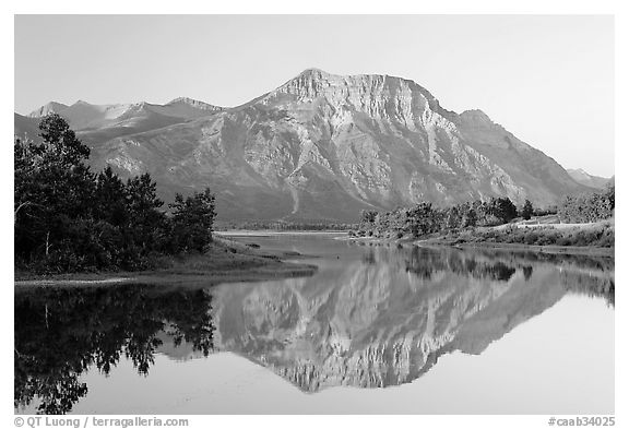 Vimy Peak reflected in Middle Waterton Lake, sunrise. Waterton Lakes National Park, Alberta, Canada