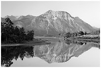 Vimy Peak reflected in Middle Waterton Lake, sunrise. Waterton Lakes National Park, Alberta, Canada (black and white)