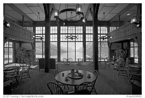 Table with view in lobby of Prince of Wales hotel. Waterton Lakes National Park, Alberta, Canada (black and white)