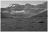 Canoists on Cameron Lake. Waterton Lakes National Park, Alberta, Canada (black and white)