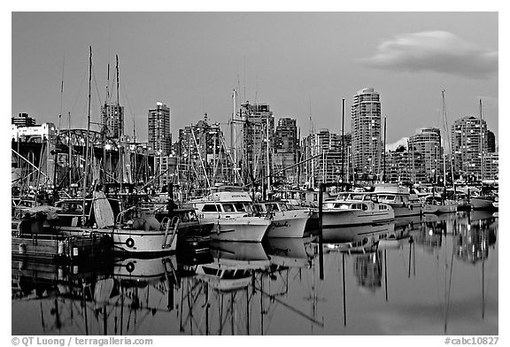 Small boat harbor and skyline at dusk. Vancouver, British Columbia, Canada (black and white)