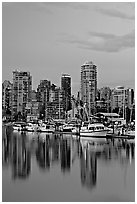 Small boat harbor and skyline at dusk. Vancouver, British Columbia, Canada (black and white)