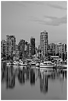 Small boat harbor and skyline at dusk. Vancouver, British Columbia, Canada ( black and white)