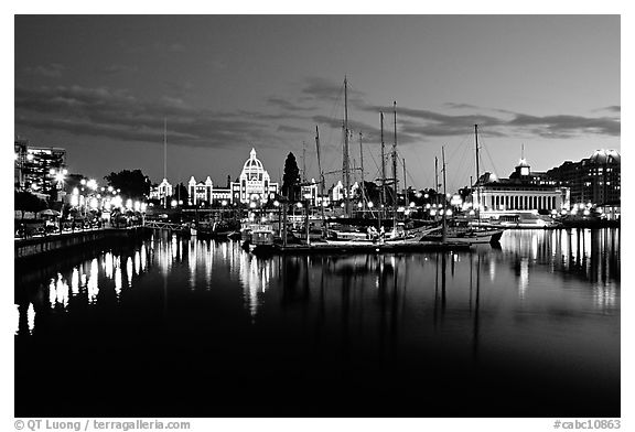 Boats in inner harbour and parliament buildings lights. Victoria, British Columbia, Canada (black and white)