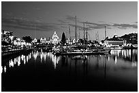 Boats in inner harbour and parliament buildings lights. Victoria, British Columbia, Canada (black and white)