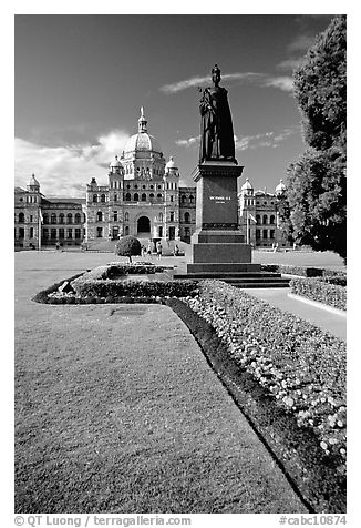 Lawn, statue of Queen Victoria for whom the city was named, and parliament. Victoria, British Columbia, Canada (black and white)