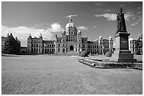 Lawn, statue of Queen Victoria for whom the city was named, and parliament. Victoria, British Columbia, Canada (black and white)