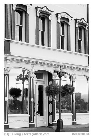 Store with reflections in windows. Victoria, British Columbia, Canada (black and white)