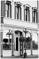 Store with reflections in windows. Victoria, British Columbia, Canada ( black and white)