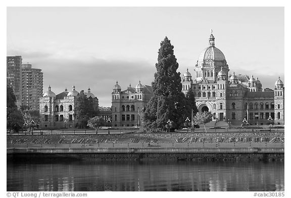 Legistlative buildings and welcome to Victoria flower decor, morning. Victoria, British Columbia, Canada (black and white)