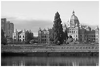 Legistlative buildings and welcome to Victoria flower decor, morning. Victoria, British Columbia, Canada (black and white)