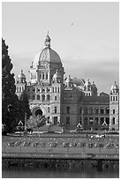 Legistlative buildings and Victoria written in flowers, morning. Victoria, British Columbia, Canada (black and white)