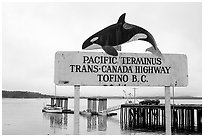 Sign marking the Pacific terminus of the trans-Canada highway, Tofino. Vancouver Island, British Columbia, Canada ( black and white)