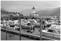Yachts, harbour and lighthouse, Port Alberni. Vancouver Island, British Columbia, Canada ( black and white)