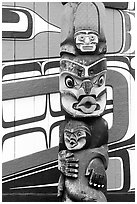 Totem pole and wall of Carving studio. Victoria, British Columbia, Canada ( black and white)
