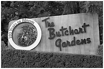 Entrance sign of Butchard Gardens. Butchart Gardens, Victoria, British Columbia, Canada (black and white)