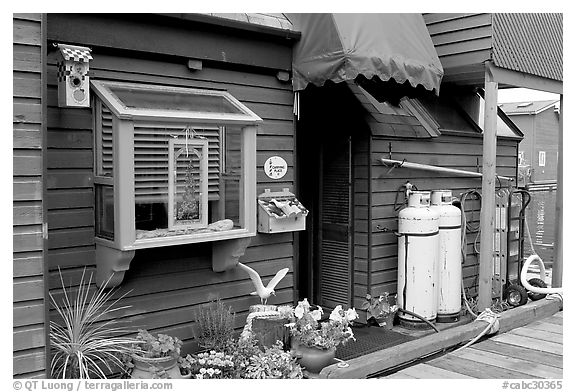 Houseboat window and propane tanks. Victoria, British Columbia, Canada (black and white)