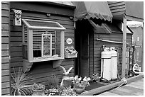 Houseboat window and propane tanks. Victoria, British Columbia, Canada (black and white)