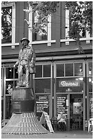 Statue and cafe in Gastown. Vancouver, British Columbia, Canada (black and white)