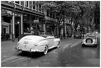 Classic cars in Water Street. Vancouver, British Columbia, Canada ( black and white)