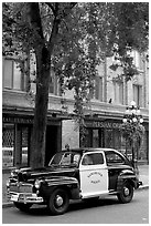 Old Police car in Water Street. Vancouver, British Columbia, Canada (black and white)