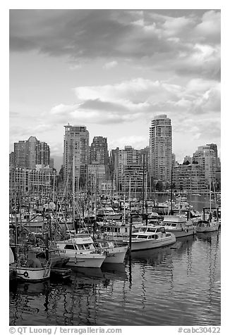 Skyline and boats seen from Fishermans harbor, late afternoon. Vancouver, British Columbia, Canada (black and white)