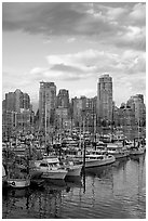 Skyline and boats seen from Fishermans harbor, late afternoon. Vancouver, British Columbia, Canada (black and white)