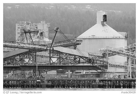 Industrial installations in harbor. Vancouver, British Columbia, Canada (black and white)