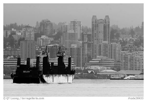 Cargo ship in harbor. Vancouver, British Columbia, Canada (black and white)