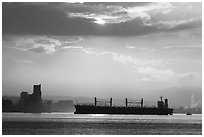 Cargo ship in harbor a sunrise. Vancouver, British Columbia, Canada (black and white)