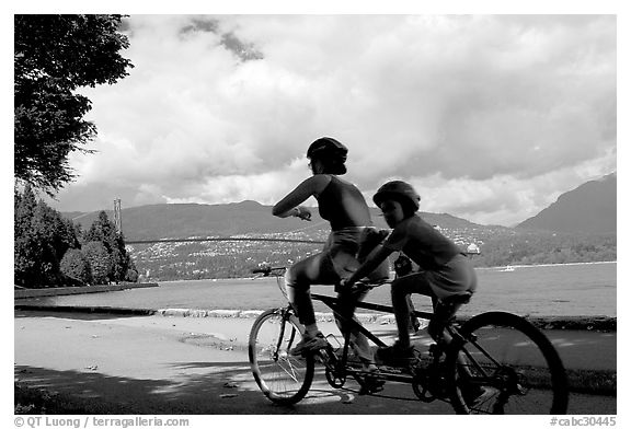 Tandem bicyclist on the trail around Stanley Park. Vancouver, British Columbia, Canada (black and white)