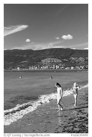 Girls on a beach, Stanley Park. Vancouver, British Columbia, Canada (black and white)