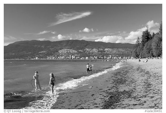 Girls playing in water, Stanley Park. Vancouver, British Columbia, Canada (black and white)