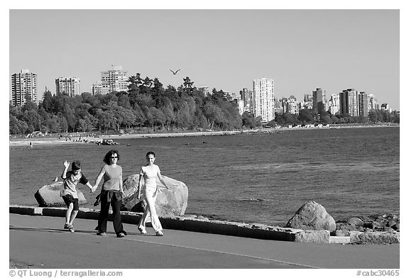 Family walking around Stanley Park. Vancouver, British Columbia, Canada (black and white)